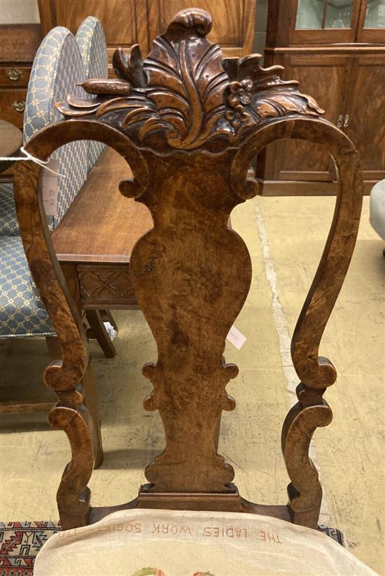 A pair of early 18th century Dutch carved walnut side chairs
